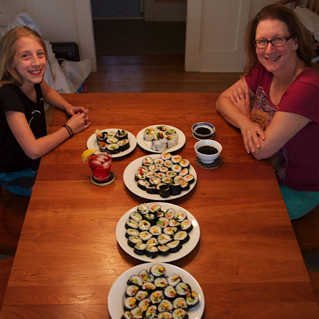 Bellevue fertility specialist Dr. Angela Thyer eating sushi with her daughter