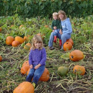parent with fertility medicine history with kids at pumpkin patch